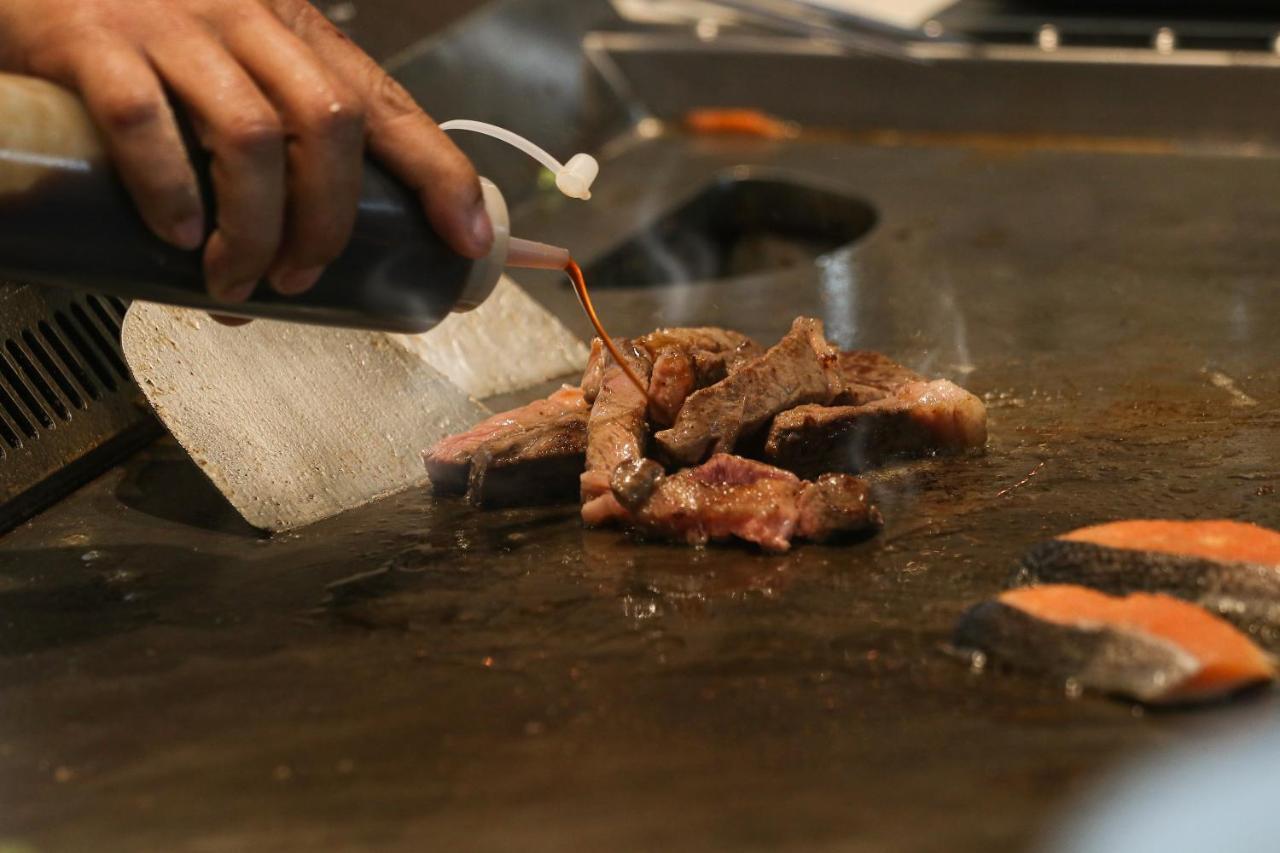 Chatrium Grand Бангкок Экстерьер фото Soy sauce being used in cooking