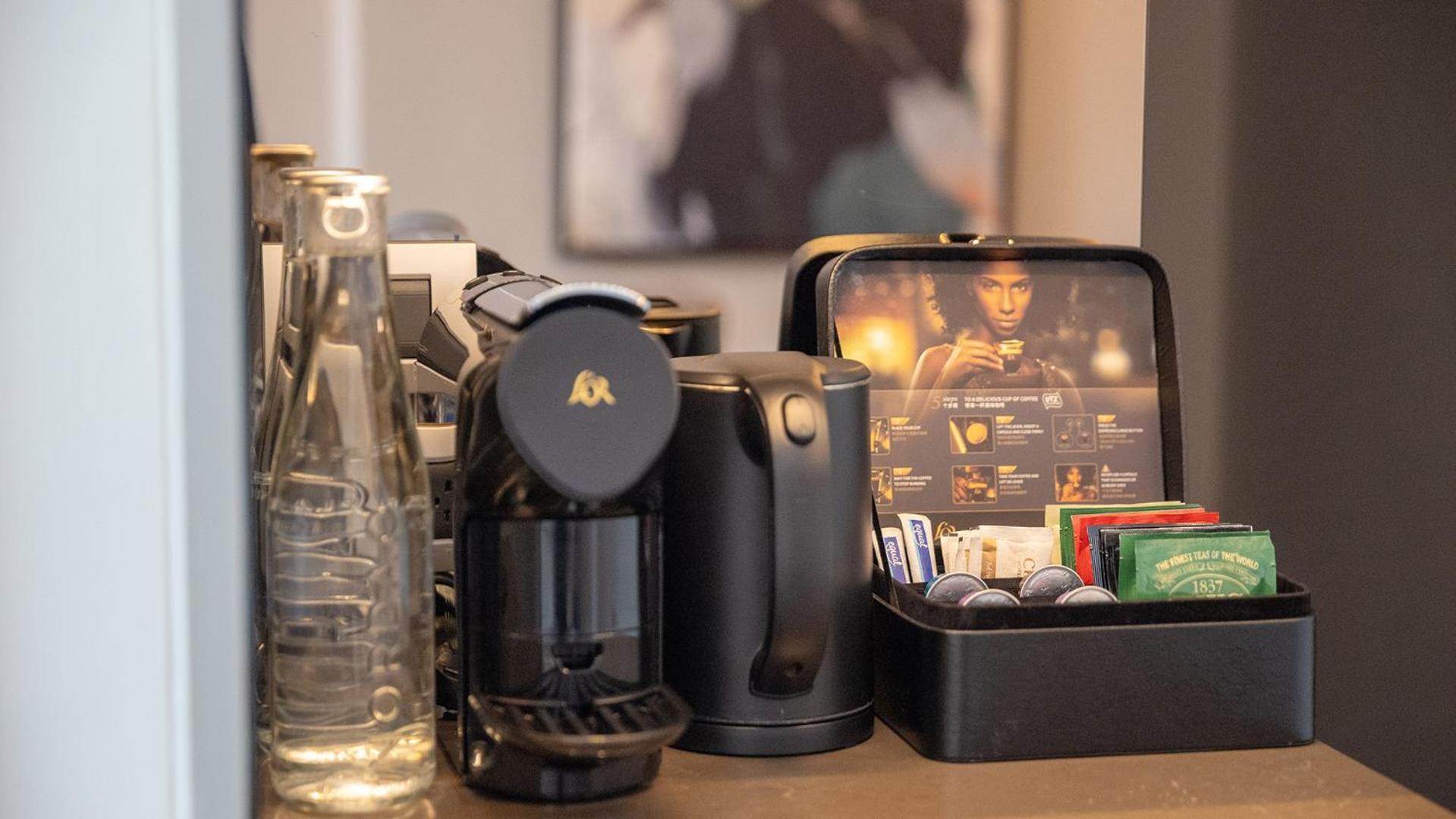 Chatrium Grand Бангкок Экстерьер фото A Nespresso coffee machine
